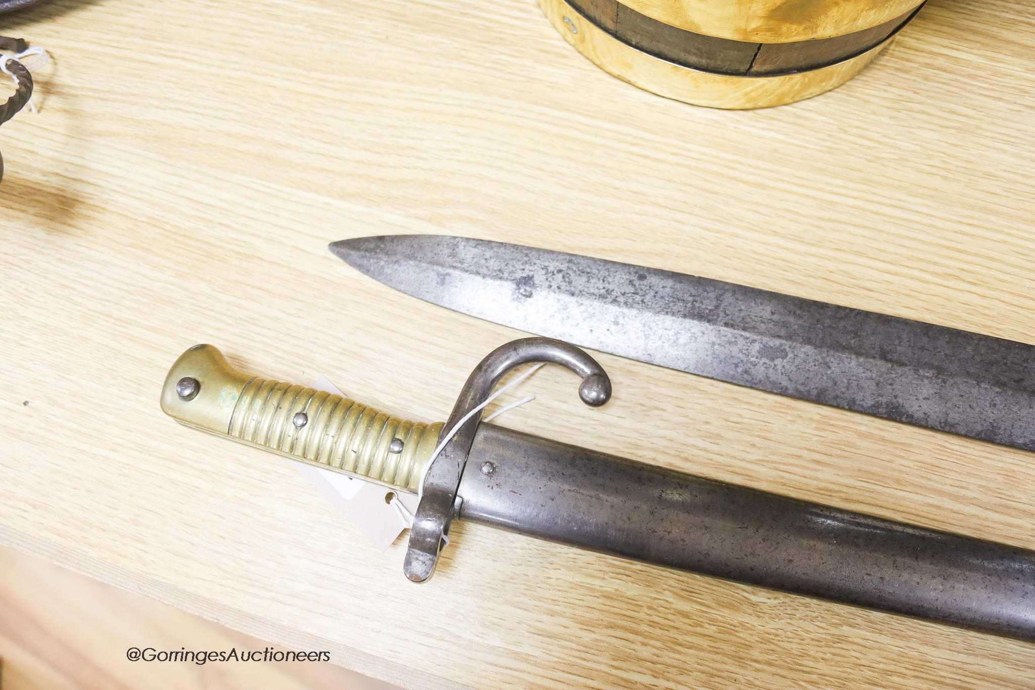 A bayonet and a 19th century French short sword, longest 71cm